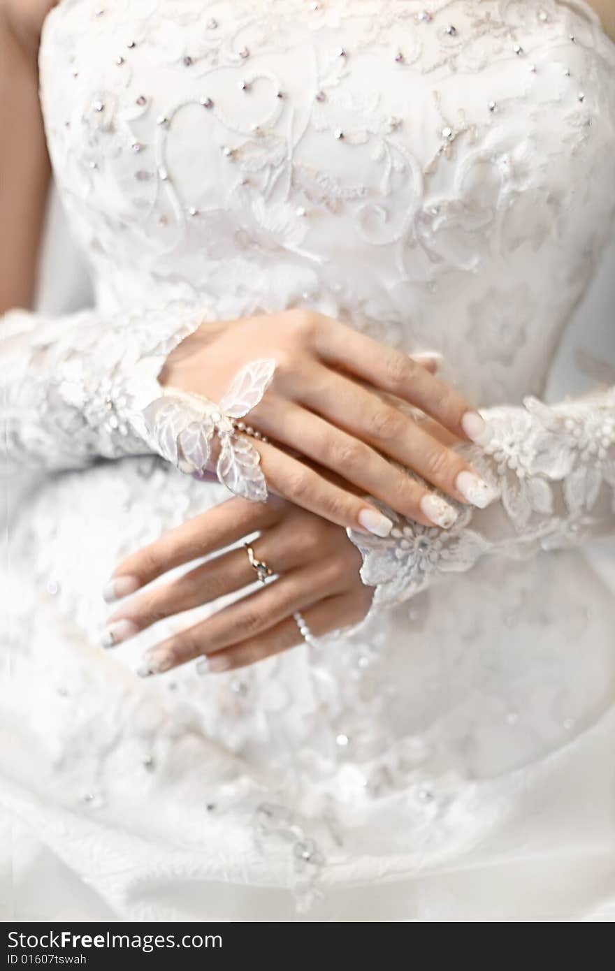 Hands of the beautiful bride