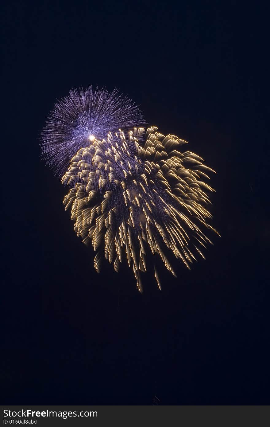 Bleu and yellow firework at night on black sky. Bleu and yellow firework at night on black sky