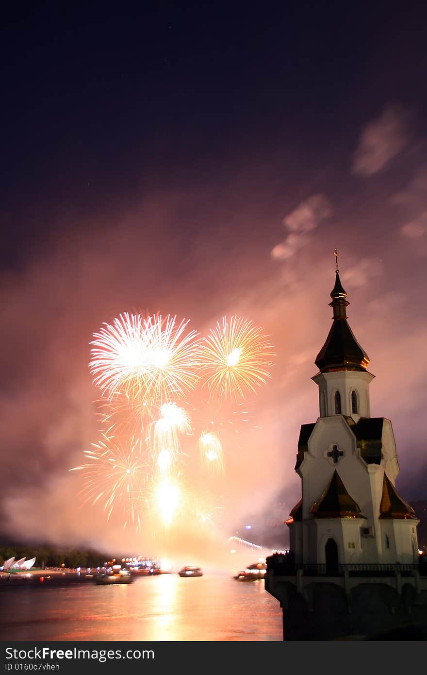 Firework and church on river