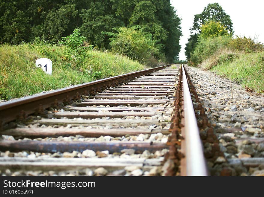 Empty old railroad near forest. Empty old railroad near forest