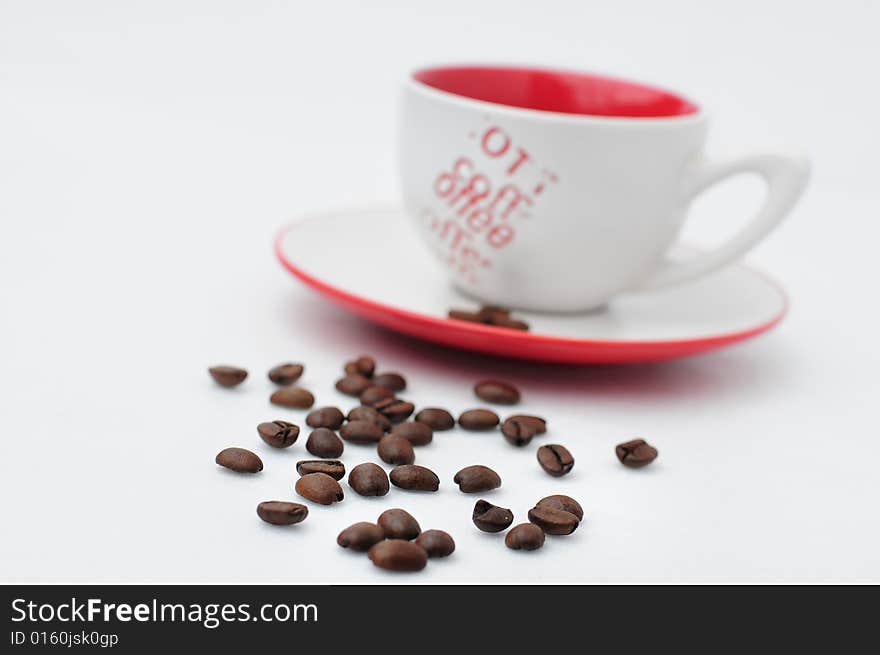 Cup of coffee with coffee grain