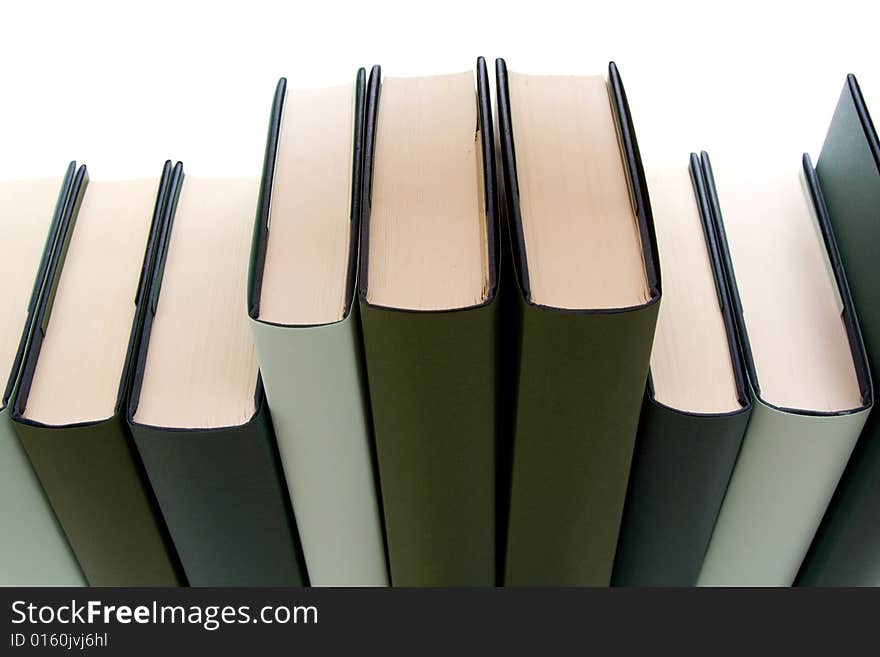 Row of books isolated on a white background