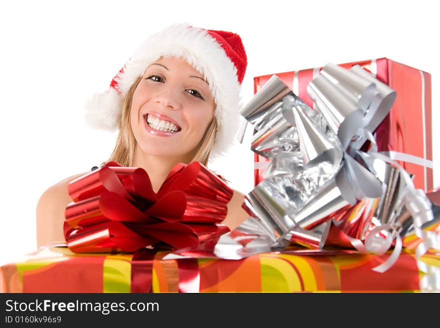 Girl with Santa s hat and colorful Christmas gifts