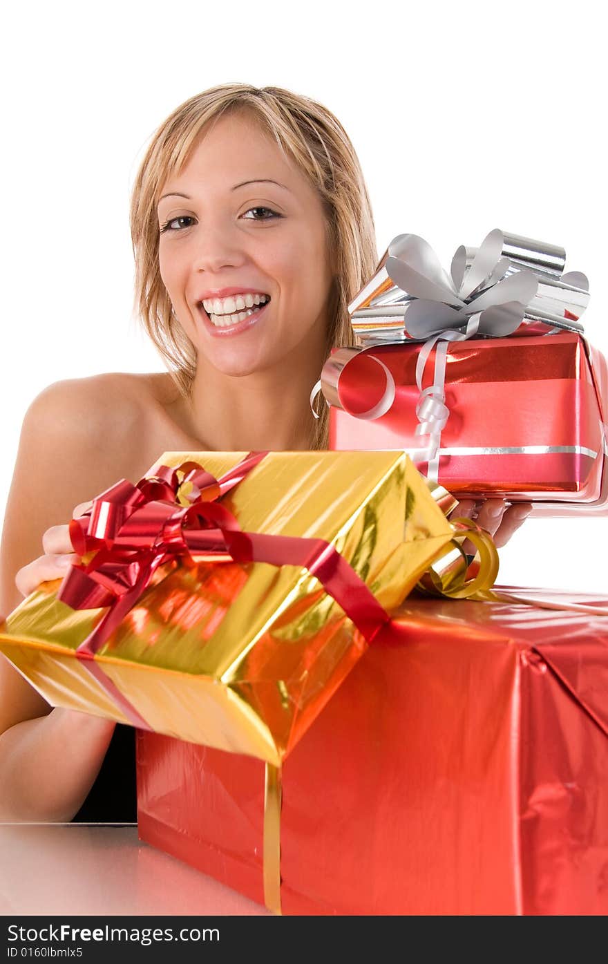 Blond smiling girl offers xmas gifts. Blond smiling girl offers xmas gifts