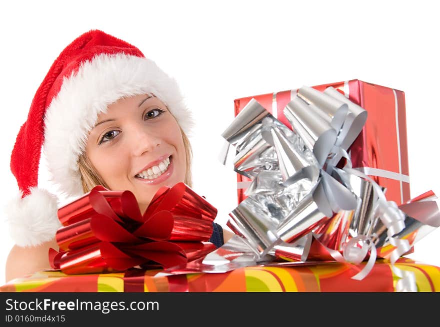 Closeup portrait of a beautiful woman dressed as Santa and holding a gift isolated on white background. Closeup portrait of a beautiful woman dressed as Santa and holding a gift isolated on white background