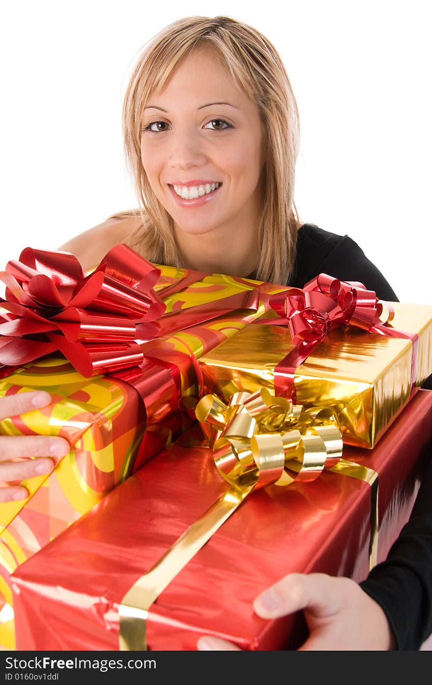 Young  smiling woman embraces Christmas gifts. Young  smiling woman embraces Christmas gifts