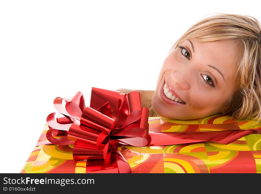 Smiling woman gifts with tender expression loos at the camera.Isolated image on white background. Smiling woman gifts with tender expression loos at the camera.Isolated image on white background