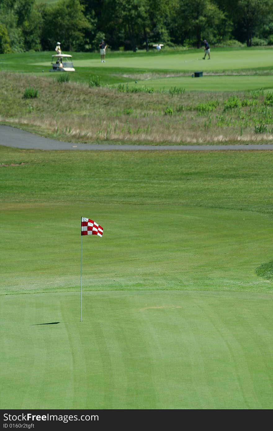 Golf Green With Red Flag