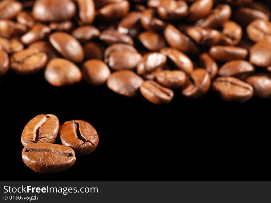 Coffee background. Perfect coffee grains. High detail