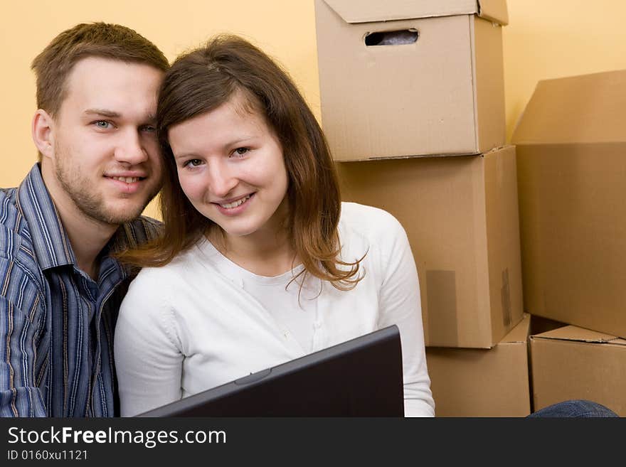 Casual couple moving in new home