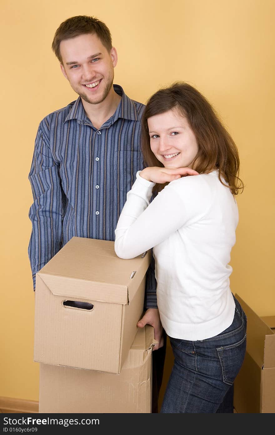 Casual couple moving in new home