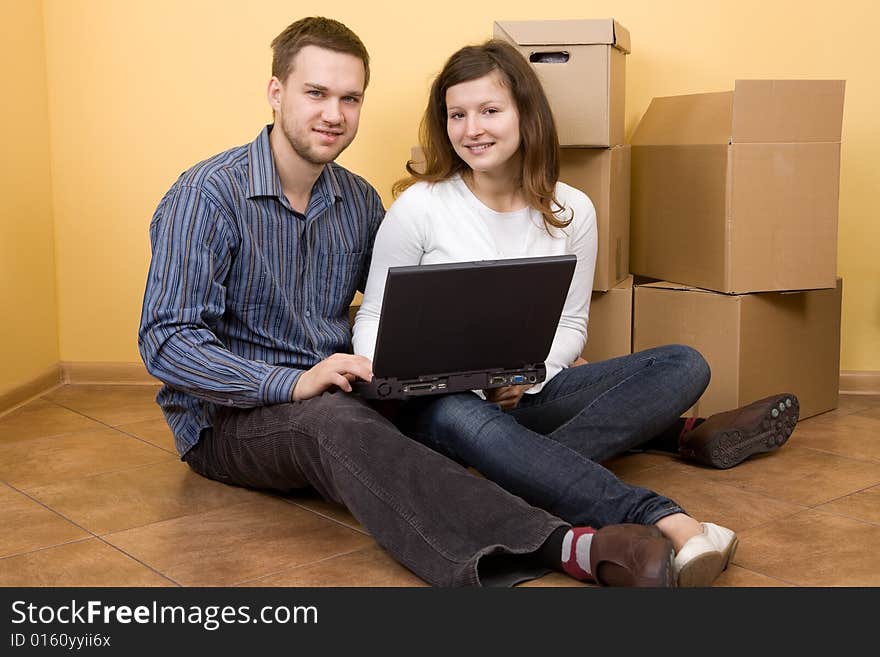 Casual couple moving in new home