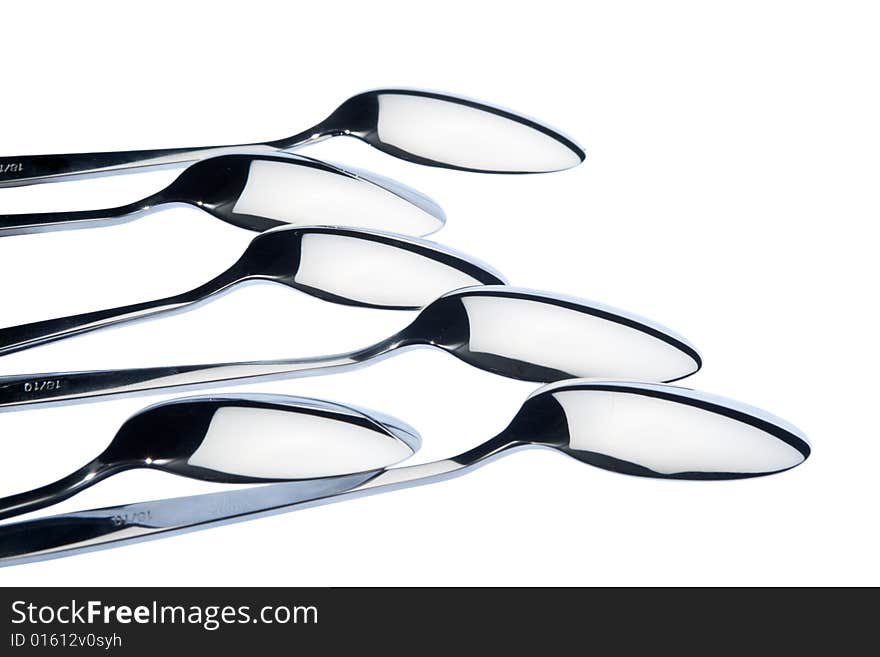 Steel spoons, isolated