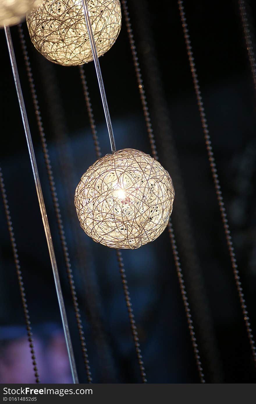 A nested lamp use as a source of light in a restaurant.