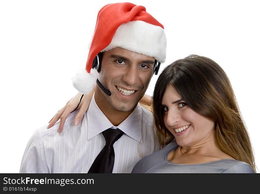 Smiling young couple against white background