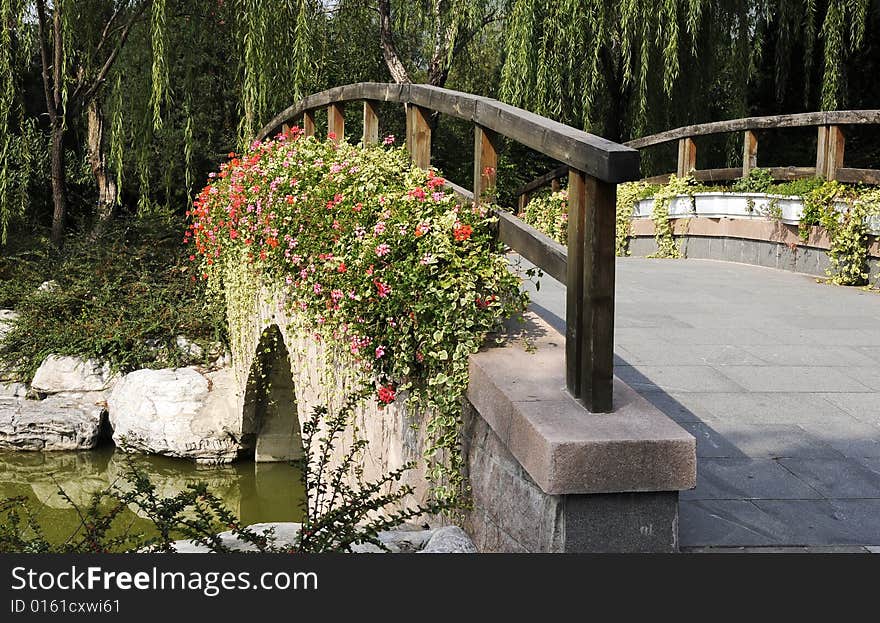 Bridge with flowers, stone bridge