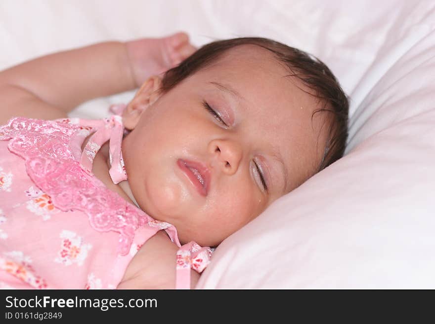 Cute baby girl sleeping in her bed. Cute baby girl sleeping in her bed