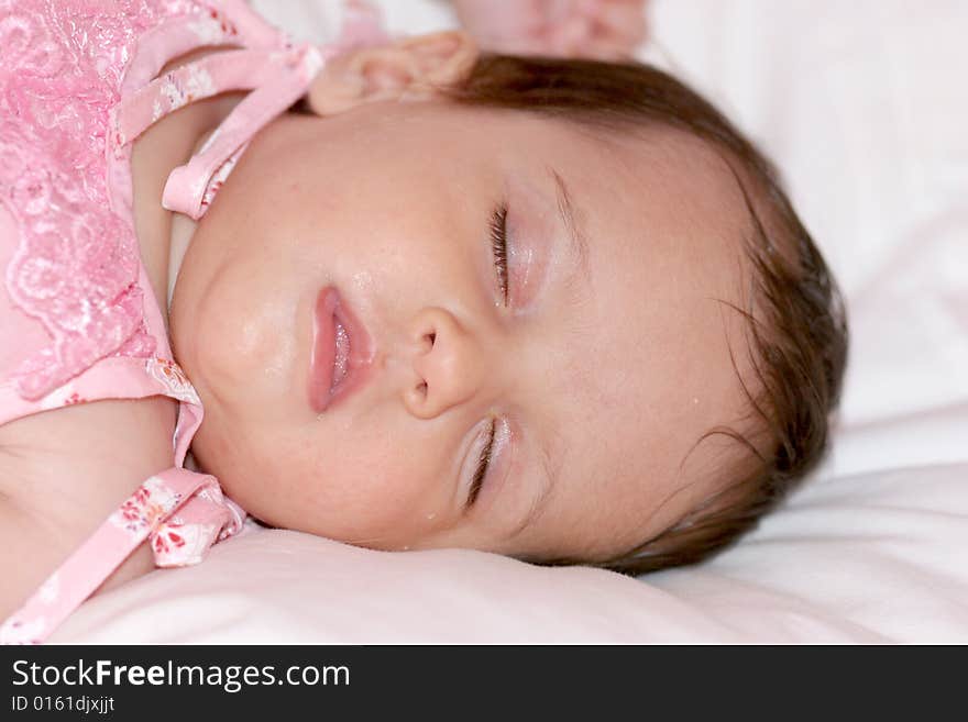 Cute baby girl sleeping in her bed. Cute baby girl sleeping in her bed