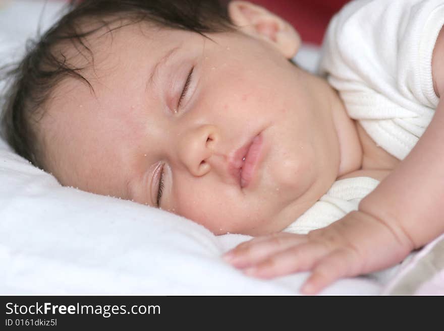 Cute baby girl sleeping in her bed. Cute baby girl sleeping in her bed