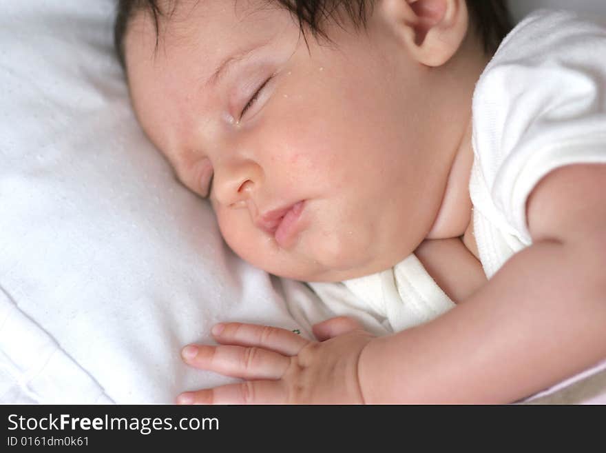 Cute baby girl sleeping in her bed. Cute baby girl sleeping in her bed