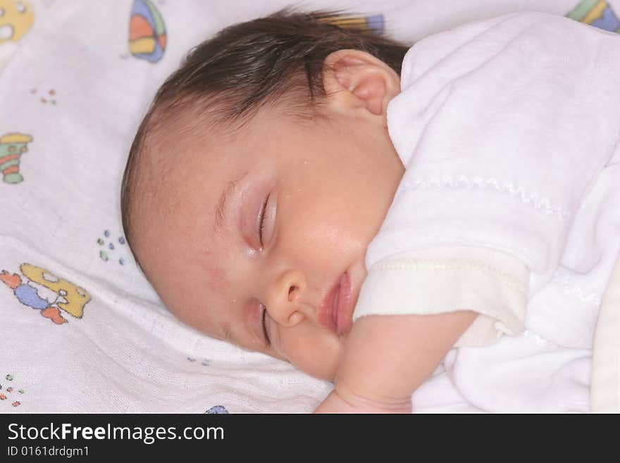 Cute baby girl sleeping in her bed. Cute baby girl sleeping in her bed