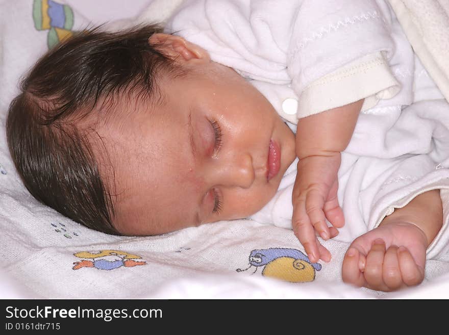 Cute baby girl sleeping in her bed. Cute baby girl sleeping in her bed