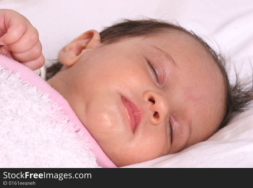 Cute baby girl sleeping in her bed. Cute baby girl sleeping in her bed