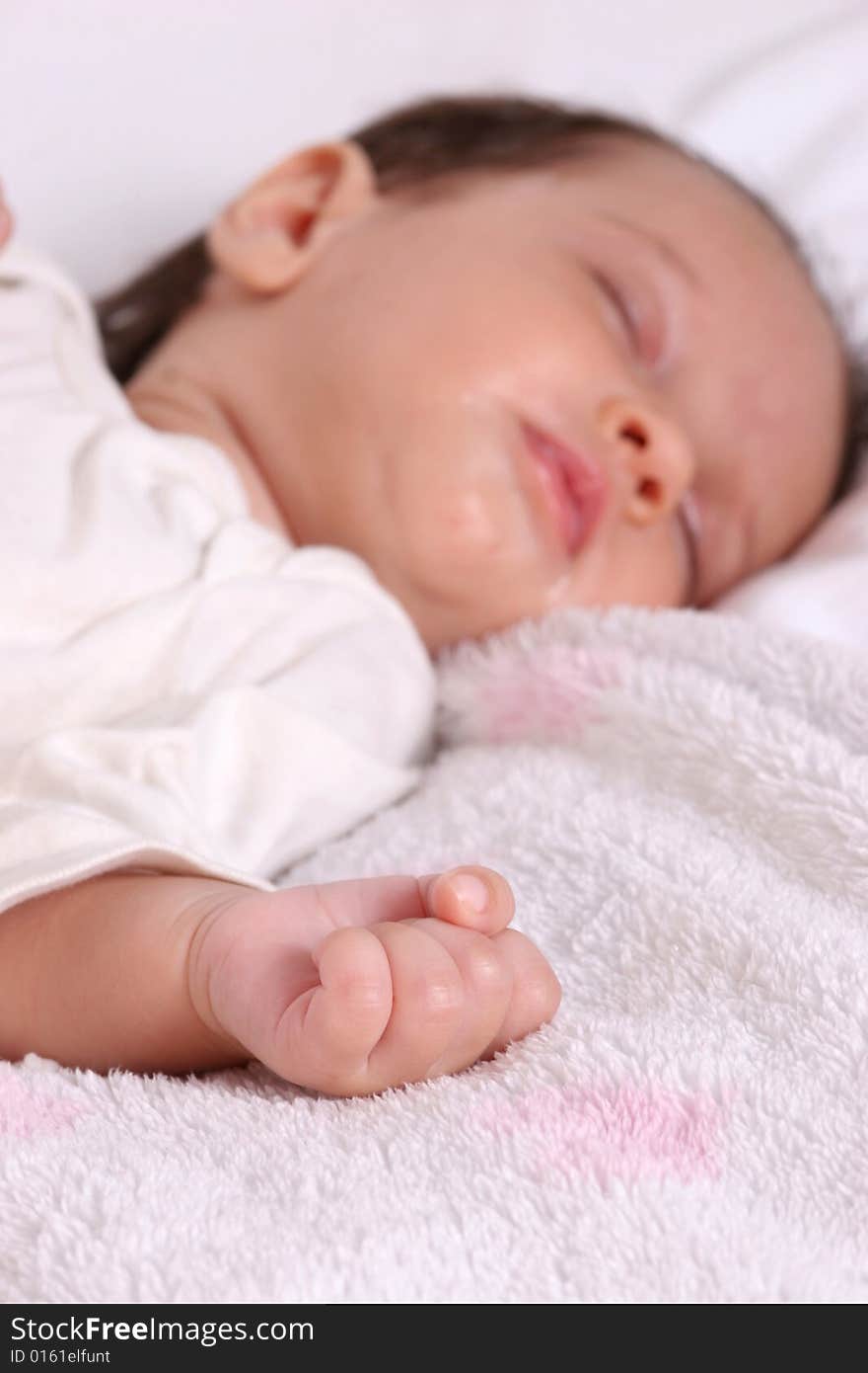 Cute baby girl sleeping in her bed. Cute baby girl sleeping in her bed