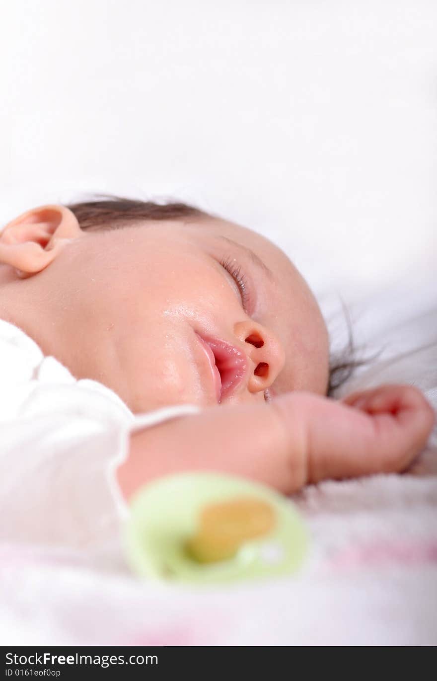 Cute baby girl sleeping in her bed. Cute baby girl sleeping in her bed