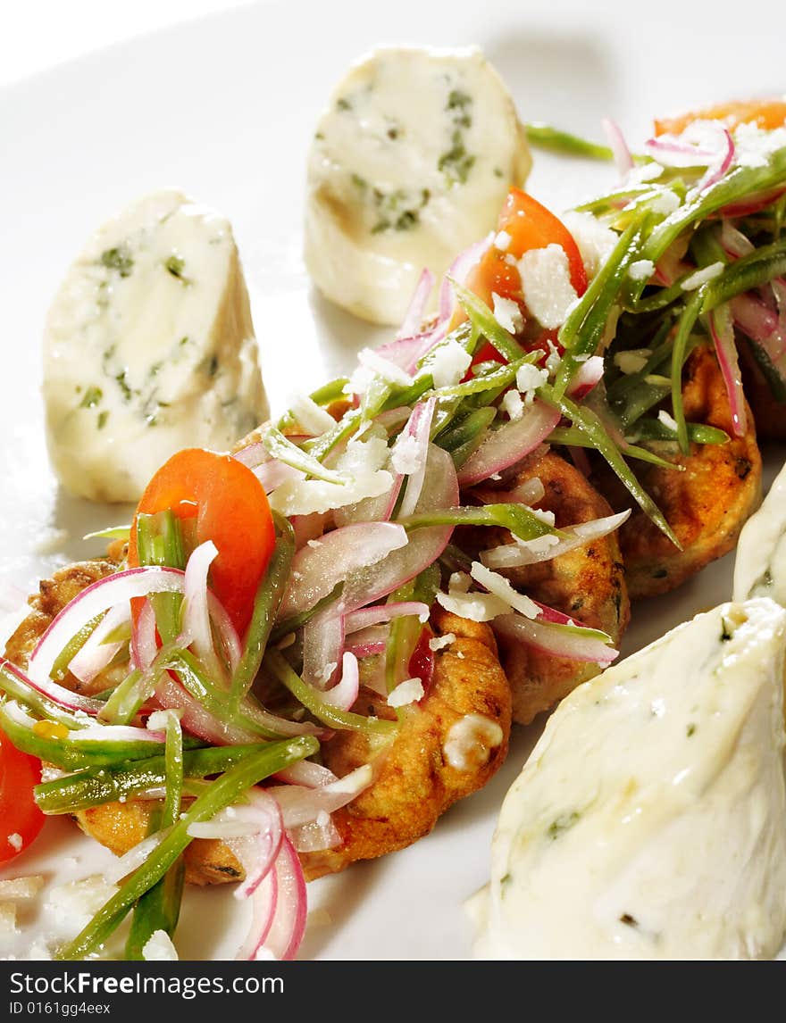 Chicken Roll with Vegetable Marrow Galette and Julienne Vegetables