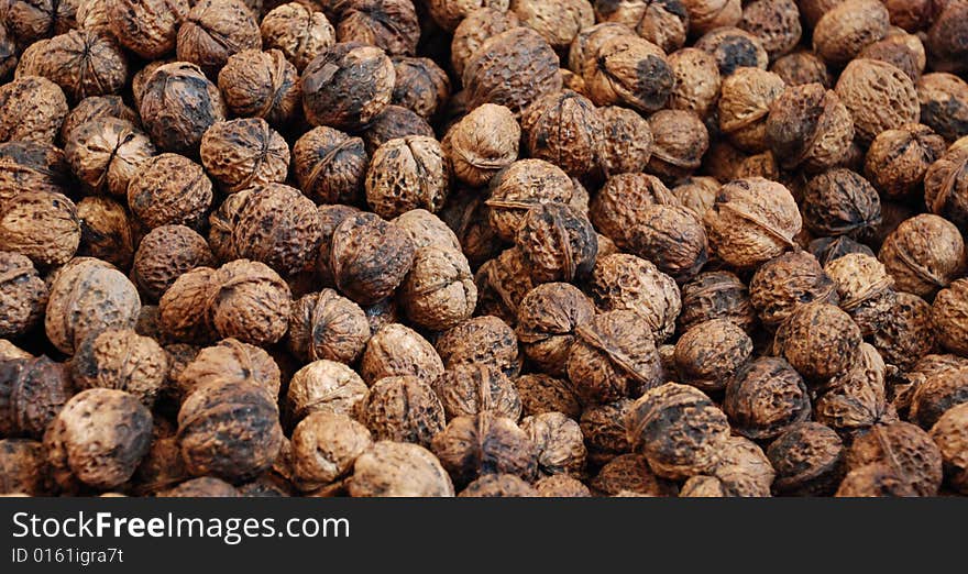 The Hard Shell Walnut Background