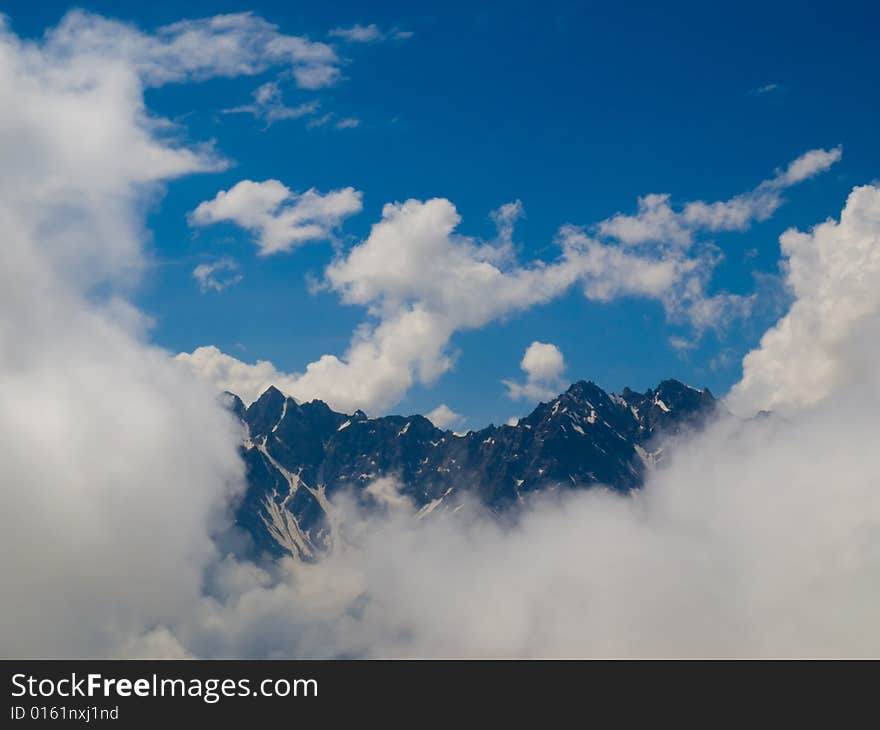 Mountains and clouds. Caucasus. Bezengi. Mountains and clouds. Caucasus. Bezengi