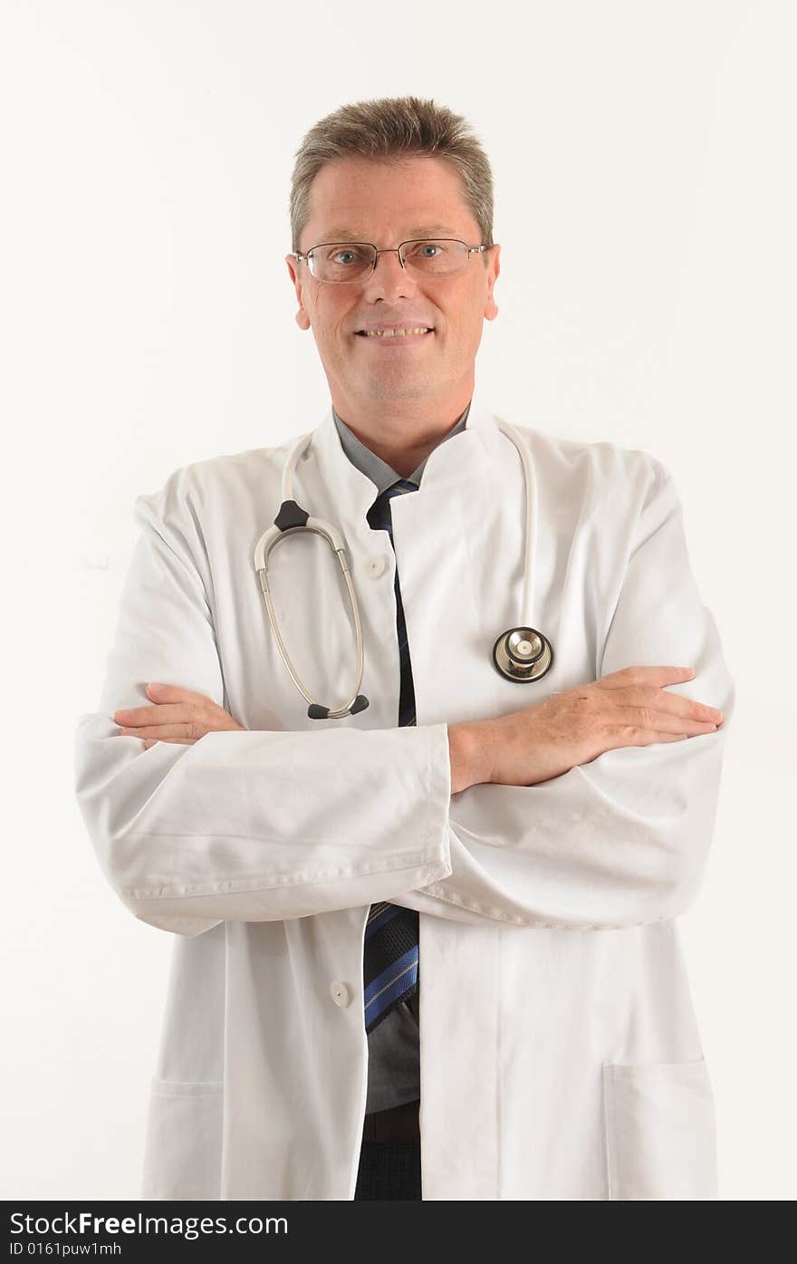 Doctor at the clinic, doing his  paperwork on a clipboard. Isolated over white. Doctor at the clinic, doing his  paperwork on a clipboard. Isolated over white.