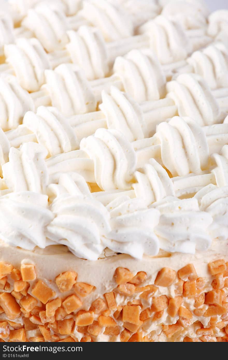 Sweet baked cake with white cream. Sweet baked cake with white cream