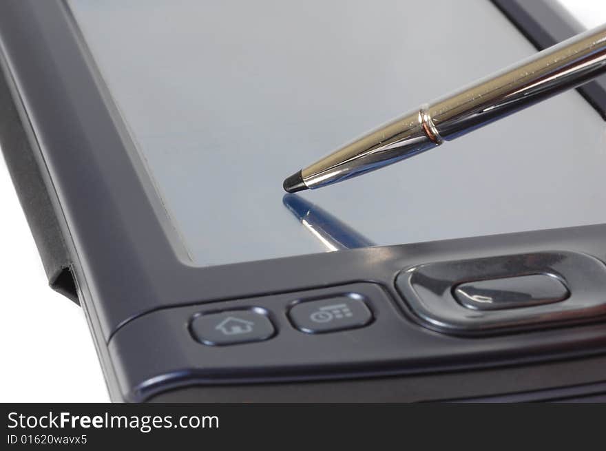 Macro shot of a palm computer and its pen