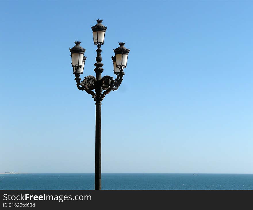 Streetlamp on Cadiz ocean's promenade. Streetlamp on Cadiz ocean's promenade