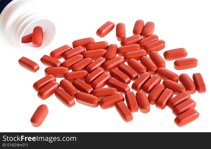 Red Pills isolated on white background