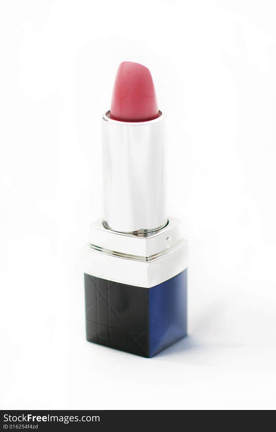 Close-up of a lipstick over white background