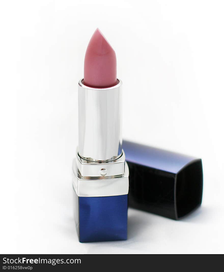 Close-up of a lipstick over white background. Close-up of a lipstick over white background