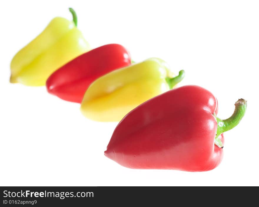 Fresh color peppers isolated on white. Fresh color peppers isolated on white