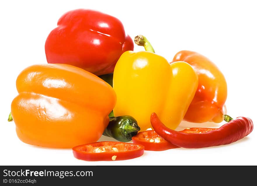 Fresh color peppers isolated on white. Fresh color peppers isolated on white