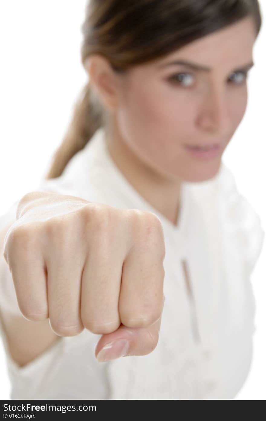 Young lady showing punch on an isolated background