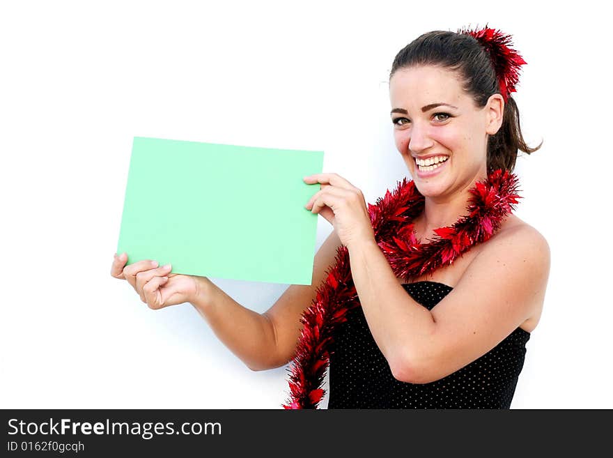 Beautiful woman holding a green card for Christmas. Beautiful woman holding a green card for Christmas.