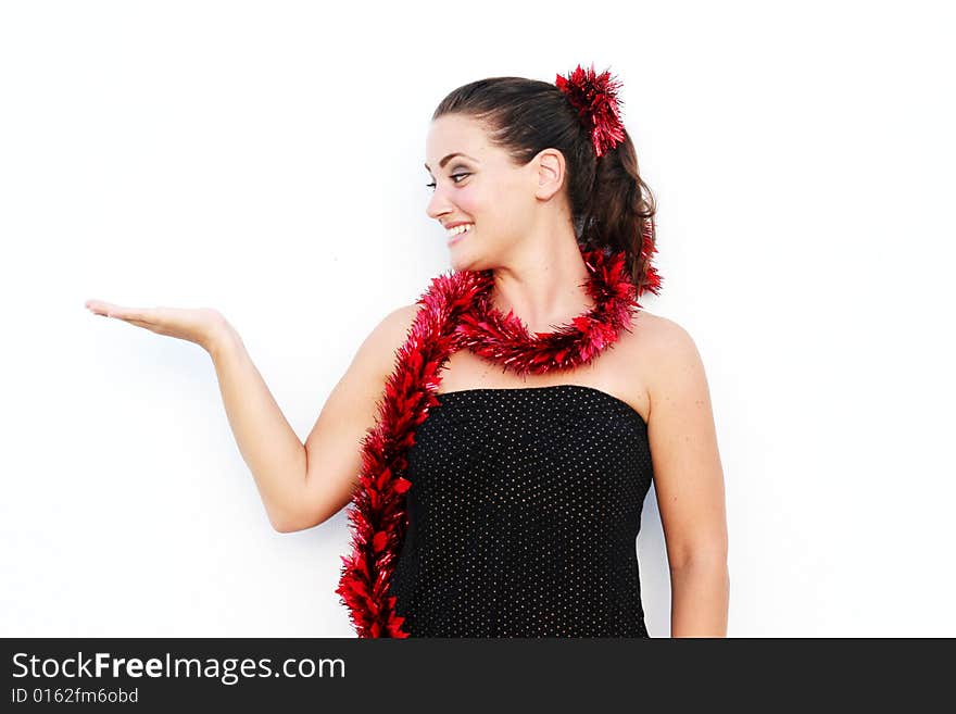 Beautiful young woman dressed in a festive Christmas outfit. Beautiful young woman dressed in a festive Christmas outfit.