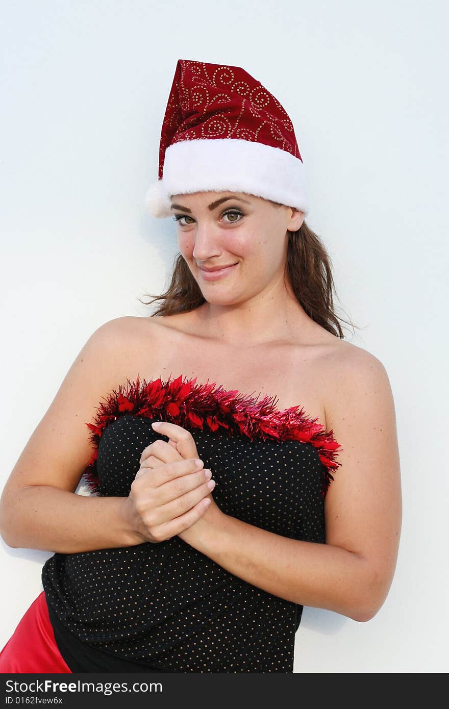 Beautiful woman wearing a festive Christmas outfit. Beautiful woman wearing a festive Christmas outfit.