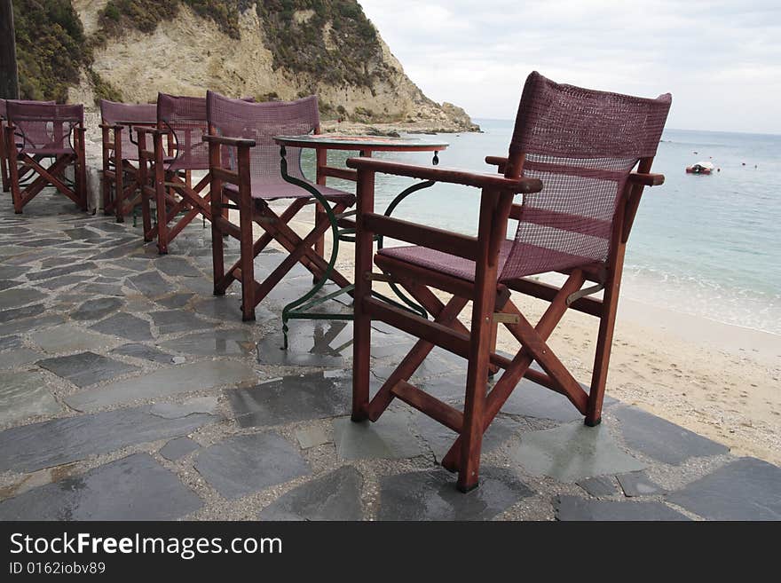 The furniture of the beach cafe in rain.