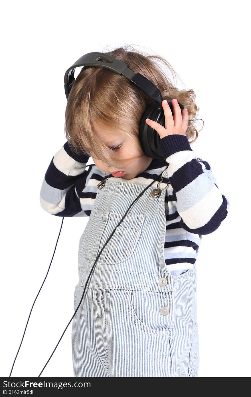 Beauty a little girl listening music on white background