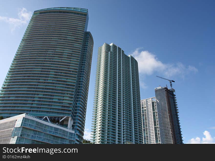 Low angle view of luxury condominiums located at Downtown Miami. Low angle view of luxury condominiums located at Downtown Miami