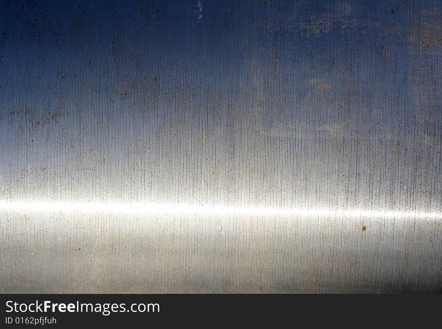 A close up picture of metal pipe. A close up picture of metal pipe