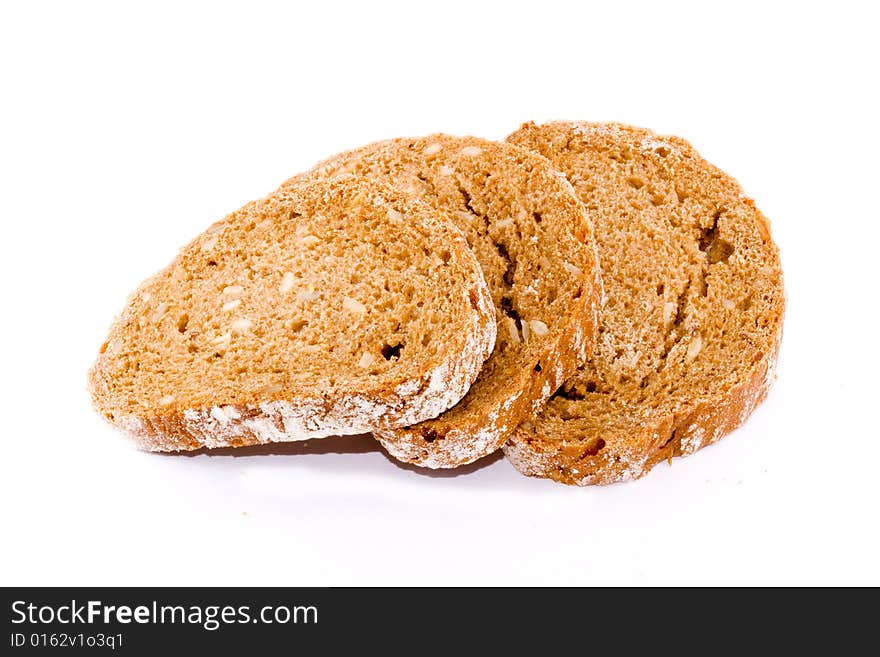 Three slices of whole bread on the white background